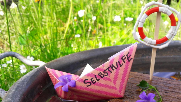 Selbsthilfeschiffchen Foto