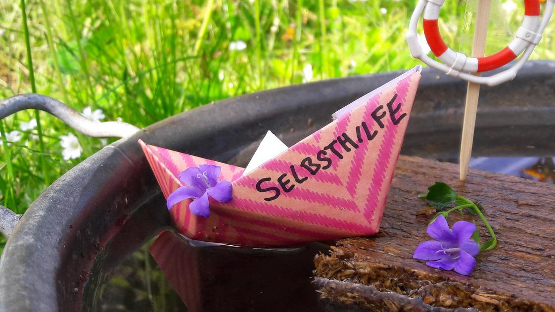Selbsthilfeschiffchen Foto