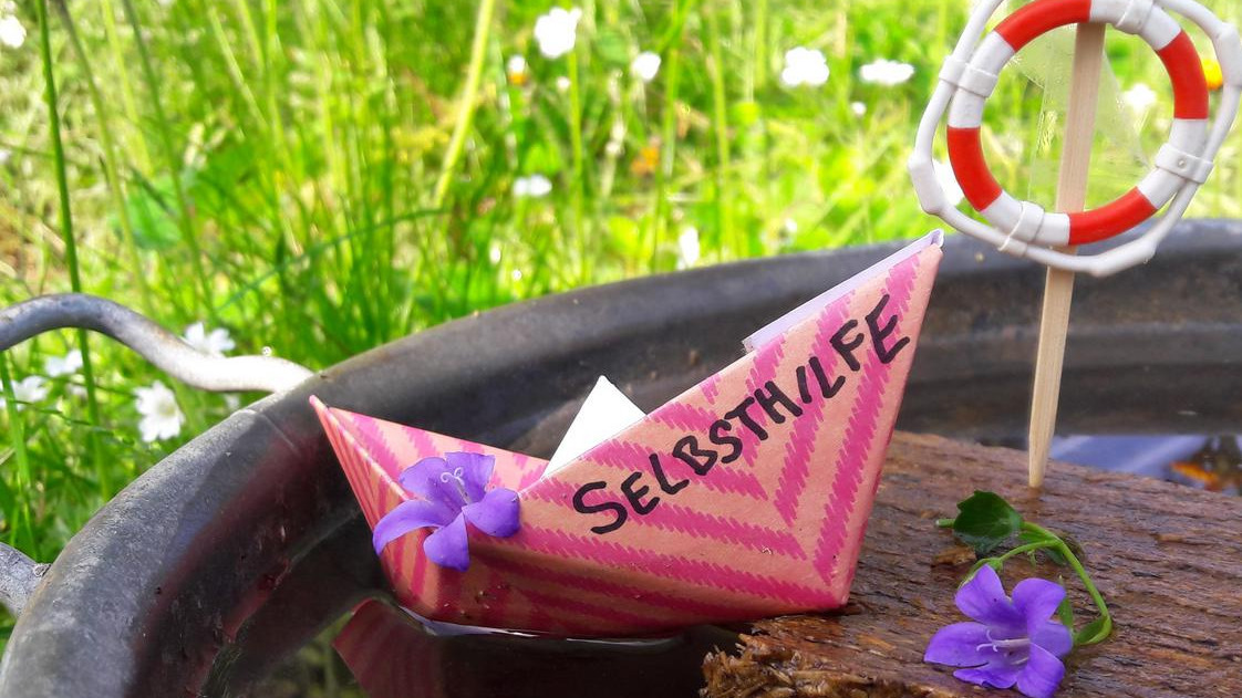 Selbsthilfeschiffchen Foto