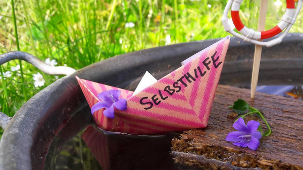 Selbsthilfeschiffchen Foto