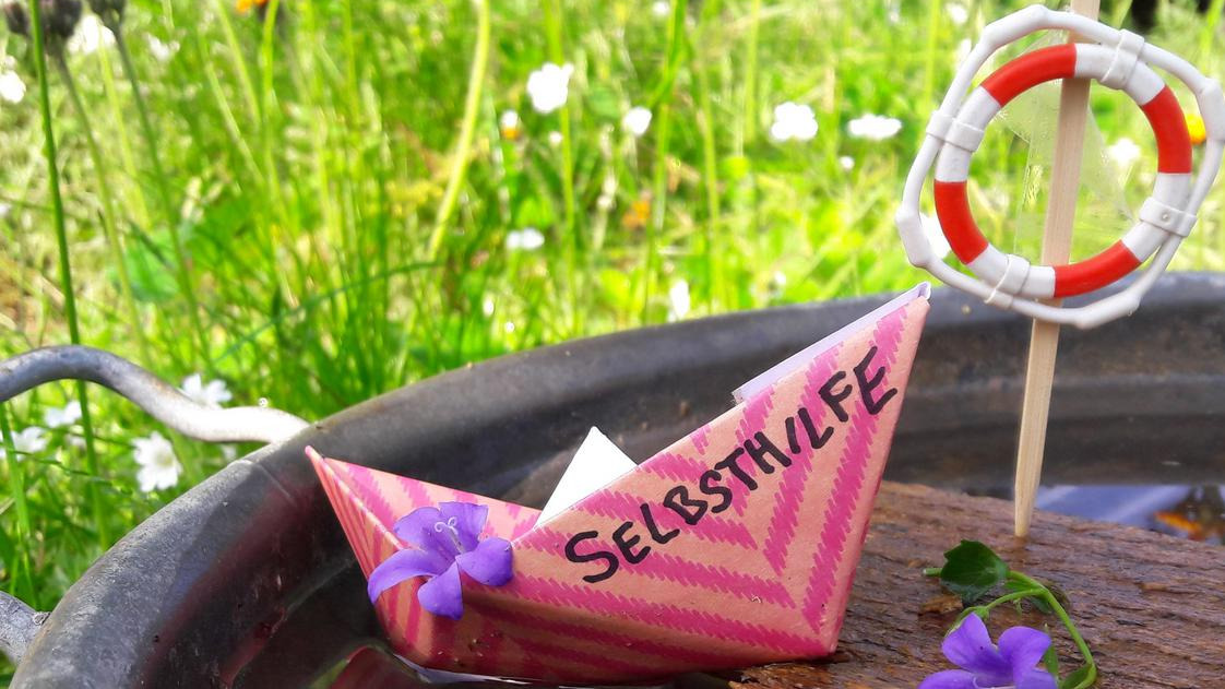 Selbsthilfeschiffchen Foto